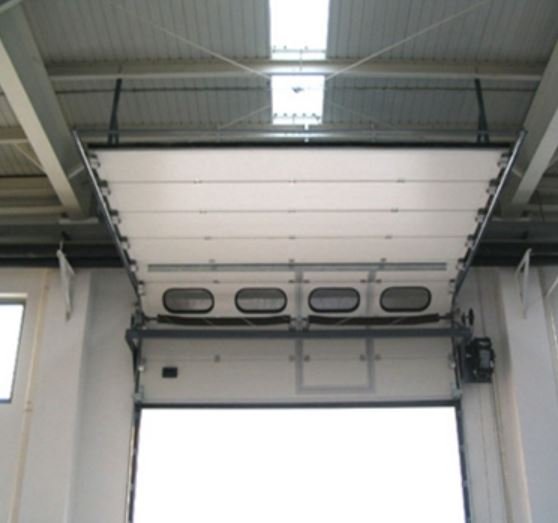 white industrial sectional overhead door